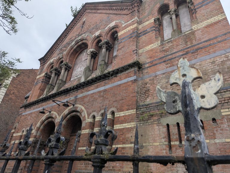 Abandoned church massive with glass panes